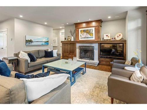 4215 15A Street Sw, Calgary, AB - Indoor Photo Showing Living Room With Fireplace