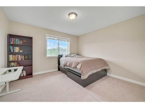 380 Rockyspring Grove Nw, Calgary, AB - Indoor Photo Showing Bedroom