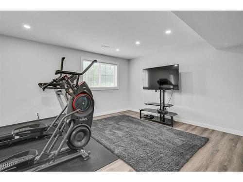 380 Rockyspring Grove Nw, Calgary, AB - Indoor Photo Showing Gym Room