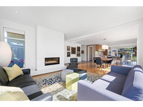 2820 12 Avenue Nw, Calgary, AB - Indoor Photo Showing Living Room With Fireplace