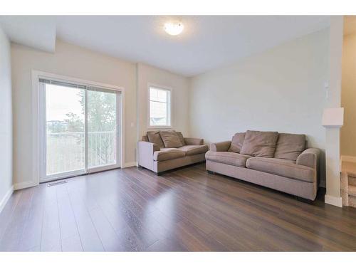 25 Redstone Circle, Calgary, AB - Indoor Photo Showing Living Room