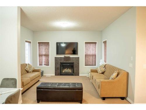 139 Skyview Shores Crescent Ne, Calgary, AB - Indoor Photo Showing Living Room With Fireplace