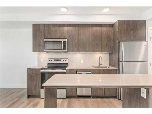 712-123 4 Street Ne, Calgary, AB - Indoor Photo Showing Kitchen With Stainless Steel Kitchen With Upgraded Kitchen