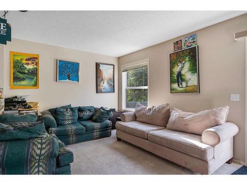 66 Panatella Villas Nw, Calgary, AB - Indoor Photo Showing Living Room