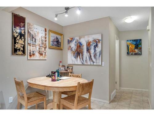 66 Panatella Villas Nw, Calgary, AB - Indoor Photo Showing Dining Room