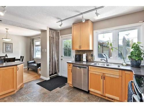 803 Seymour Avenue Sw, Calgary, AB - Indoor Photo Showing Kitchen With Double Sink