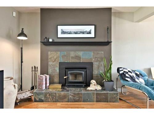 803 Seymour Avenue Sw, Calgary, AB - Indoor Photo Showing Living Room With Fireplace