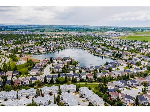 72 Crystal Shores Cove, Okotoks, AB - Outdoor With Body Of Water With View