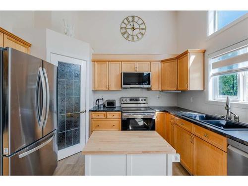 72 Crystal Shores Cove, Okotoks, AB - Indoor Photo Showing Kitchen With Stainless Steel Kitchen With Double Sink