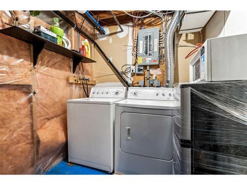 18-5810 Patina Drive Sw, Calgary, AB - Indoor Photo Showing Laundry Room