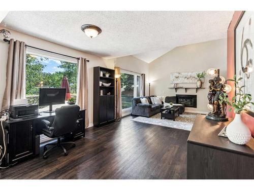 18-5810 Patina Drive Sw, Calgary, AB - Indoor With Fireplace