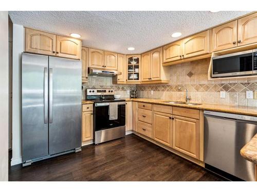 18-5810 Patina Drive Sw, Calgary, AB - Indoor Photo Showing Kitchen With Stainless Steel Kitchen