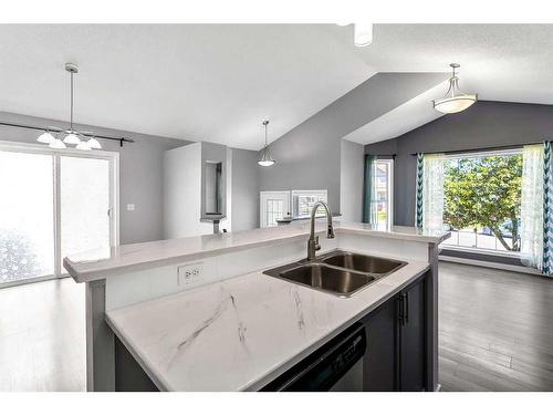 187 Bridlewood Avenue Sw, Calgary, AB - Indoor Photo Showing Kitchen With Double Sink