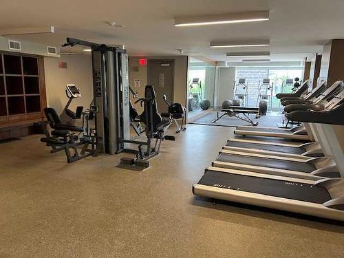 602-108 Waterfront Court Sw, Calgary, AB - Indoor Photo Showing Gym Room