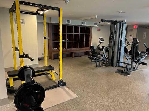 602-108 Waterfront Court Sw, Calgary, AB - Indoor Photo Showing Gym Room
