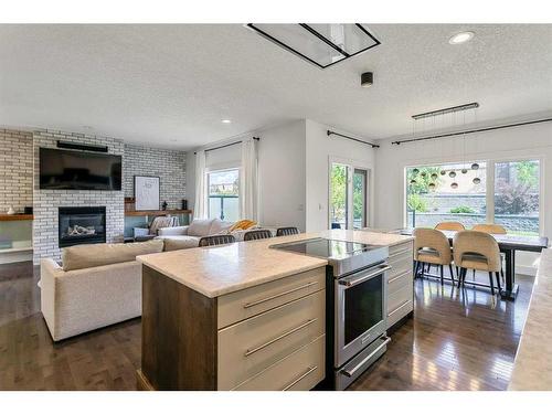 270 Discovery Ridge Way Sw, Calgary, AB - Indoor Photo Showing Living Room With Fireplace