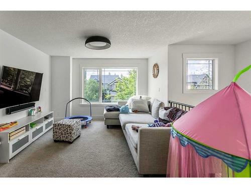 270 Discovery Ridge Way Sw, Calgary, AB - Indoor Photo Showing Living Room