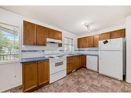 119 Arbour Lake Road, Calgary, AB - Indoor Photo Showing Kitchen