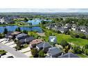 51 Billy Haynes Trail, Okotoks, AB  - Outdoor With Body Of Water With View 