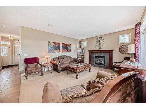 51 Billy Haynes Trail, Okotoks, AB - Indoor Photo Showing Living Room With Fireplace