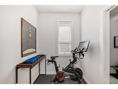 101-830 78 Street Sw, Calgary, AB - Indoor Photo Showing Gym Room