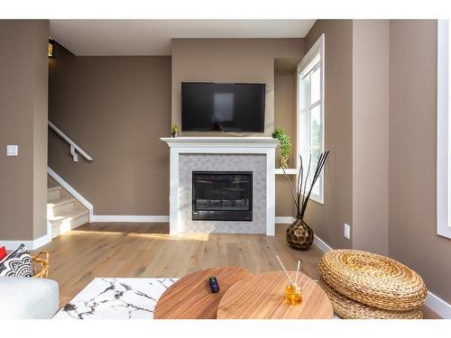1936 26A Street Sw, Calgary, AB - Indoor Photo Showing Living Room With Fireplace