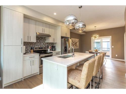 1936 26A Street Sw, Calgary, AB - Indoor Photo Showing Kitchen With Double Sink With Upgraded Kitchen