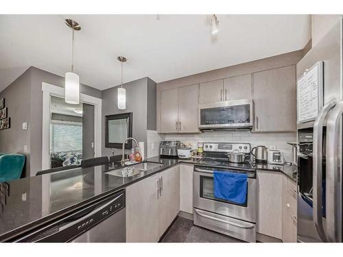 2111-240 Skyview Ranch Road Ne, Calgary, AB - Indoor Photo Showing Kitchen With Stainless Steel Kitchen With Upgraded Kitchen