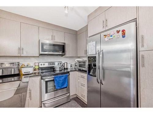 2111-240 Skyview Ranch Road Ne, Calgary, AB - Indoor Photo Showing Kitchen With Stainless Steel Kitchen