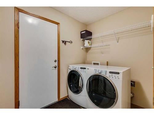 56 Valley Stream Circle Nw, Calgary, AB - Indoor Photo Showing Laundry Room