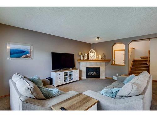 56 Valley Stream Circle Nw, Calgary, AB - Indoor Photo Showing Living Room With Fireplace