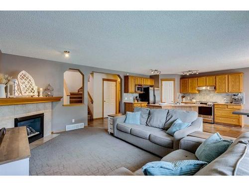 56 Valley Stream Circle Nw, Calgary, AB - Indoor Photo Showing Living Room With Fireplace