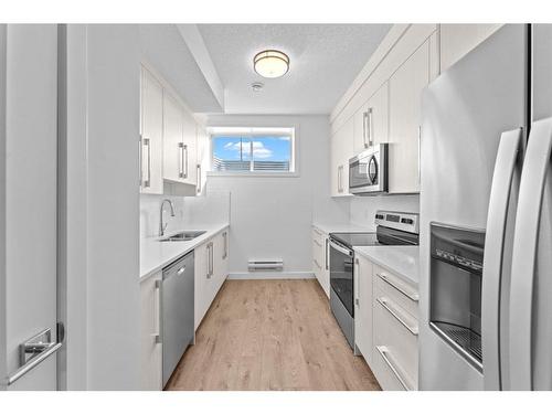 265 Rangeview Way Se, Calgary, AB - Indoor Photo Showing Kitchen With Stainless Steel Kitchen