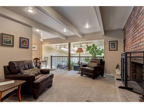 514 37 Street Nw, Calgary, AB - Indoor Photo Showing Living Room With Fireplace