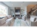 180 Lakewood Circle, Strathmore, AB  - Indoor Photo Showing Living Room With Fireplace 