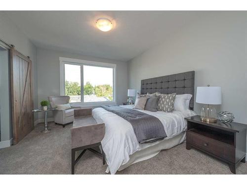 180 Lakewood Circle, Strathmore, AB - Indoor Photo Showing Bedroom