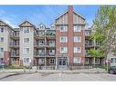 2305-73 Erin Woods Court Se, Calgary, AB  - Outdoor With Balcony With Facade 