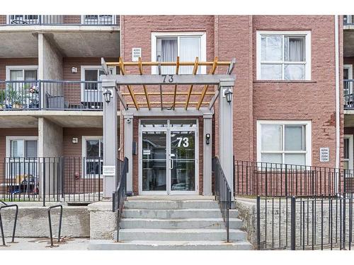 2305-73 Erin Woods Court Se, Calgary, AB - Outdoor With Balcony With Facade