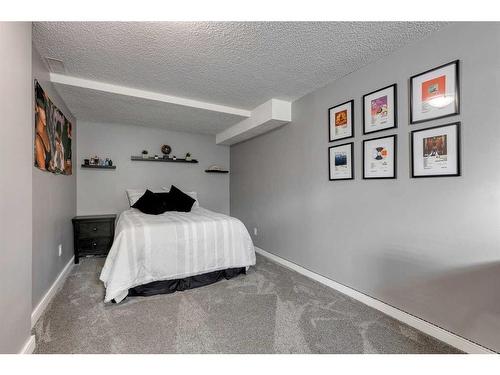 117 Hill Spring Meadows, Rural Rocky View County, AB - Indoor Photo Showing Bedroom