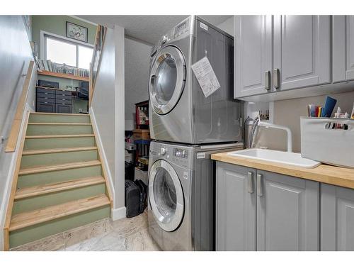 117 Hill Spring Meadows, Rural Rocky View County, AB - Indoor Photo Showing Laundry Room