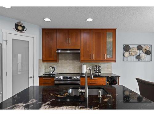 6 Cranwell Manor Se, Calgary, AB - Indoor Photo Showing Kitchen With Double Sink