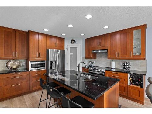 6 Cranwell Manor Se, Calgary, AB - Indoor Photo Showing Kitchen With Stainless Steel Kitchen With Double Sink