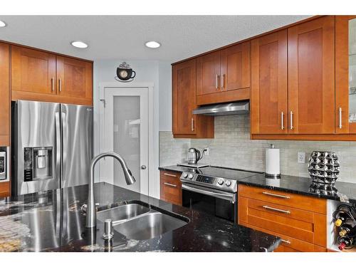 6 Cranwell Manor Se, Calgary, AB - Indoor Photo Showing Kitchen With Stainless Steel Kitchen With Double Sink