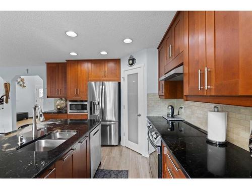 6 Cranwell Manor Se, Calgary, AB - Indoor Photo Showing Kitchen With Stainless Steel Kitchen With Double Sink With Upgraded Kitchen