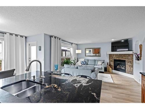 6 Cranwell Manor Se, Calgary, AB - Indoor With Fireplace