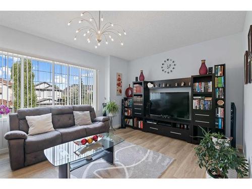 6 Cranwell Manor Se, Calgary, AB - Indoor Photo Showing Living Room