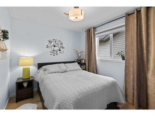 6 Cranwell Manor Se, Calgary, AB - Indoor Photo Showing Bedroom