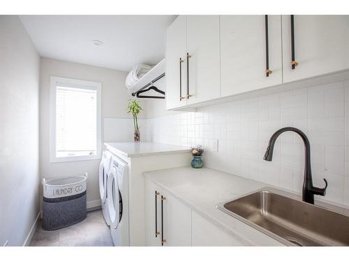 36 Timberline Way Sw, Calgary, AB - Indoor Photo Showing Laundry Room