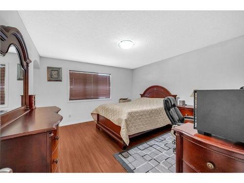 70 Saddlecrest Terrace Ne, Calgary, AB - Indoor Photo Showing Bedroom