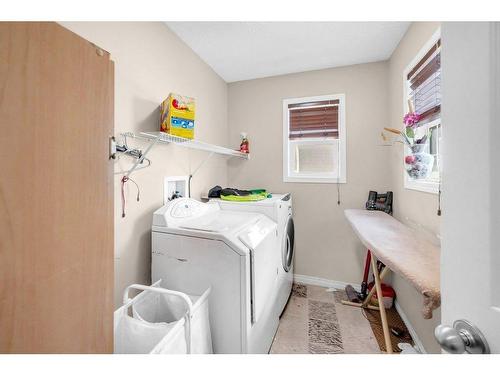 70 Saddlecrest Terrace Ne, Calgary, AB - Indoor Photo Showing Laundry Room